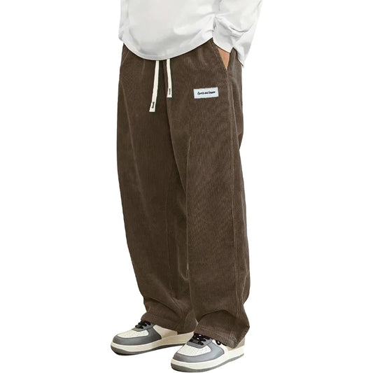 Men's casual corduroy trousers, loose fit, ideal for outdoor wear and streetwear style.